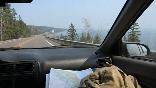 Highway 61 curving beside Lake Superior on the drive toward the Gunflint Trail